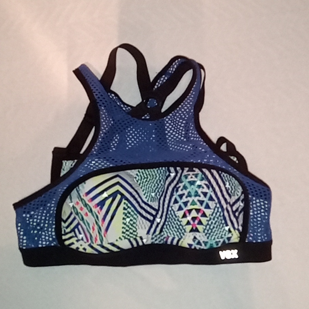VSX sports bra mesh accent & reflective accent.